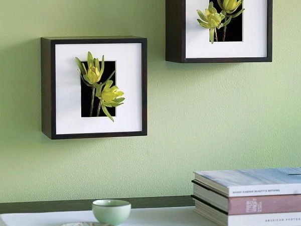 Neat idea! Make a wall vase/shadow box. Try it!
