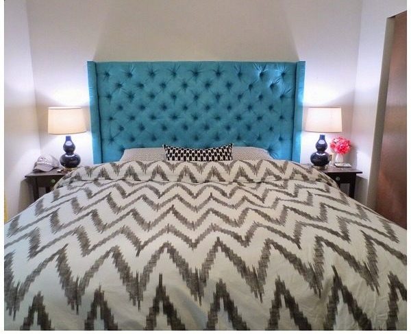 Check out this tutorial on how to make a deep diamond tufted headboard. Looks easy enough!