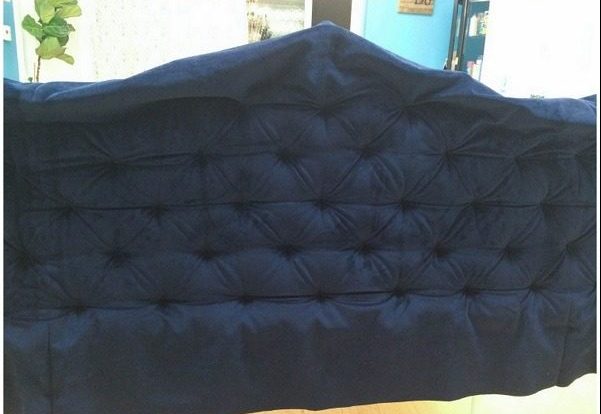 Check out this tutorial on how to make a diamond tufted headboard. Looks easy enough!