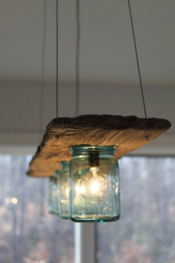 Check out this cool rustic wooden board and mason jar chandelier 