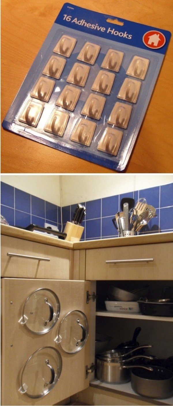 Brilliant idea to use adhesive hooks to store lids on the inside of cabinet doors