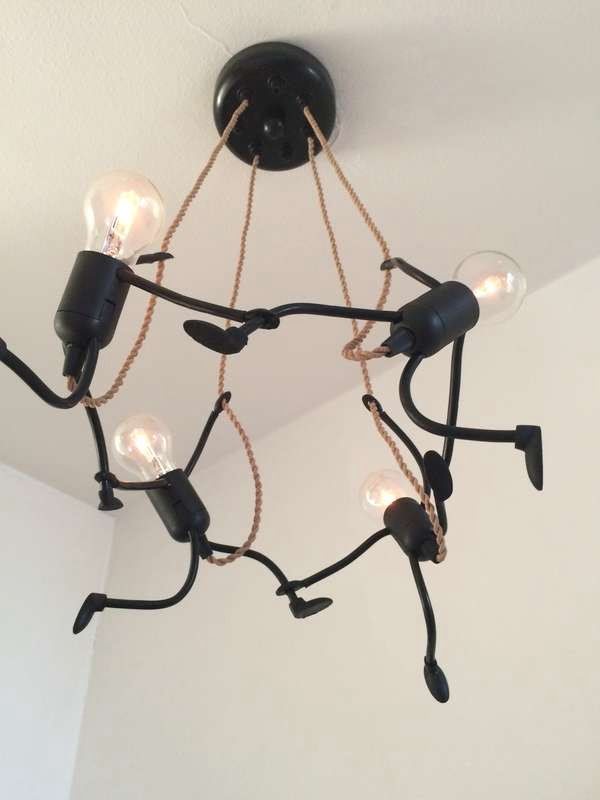 Check out this adorable light bulb figure chandelier 