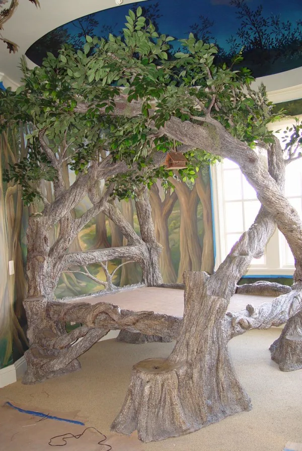 Truly enchanting bed frame from tree trunks with branches 