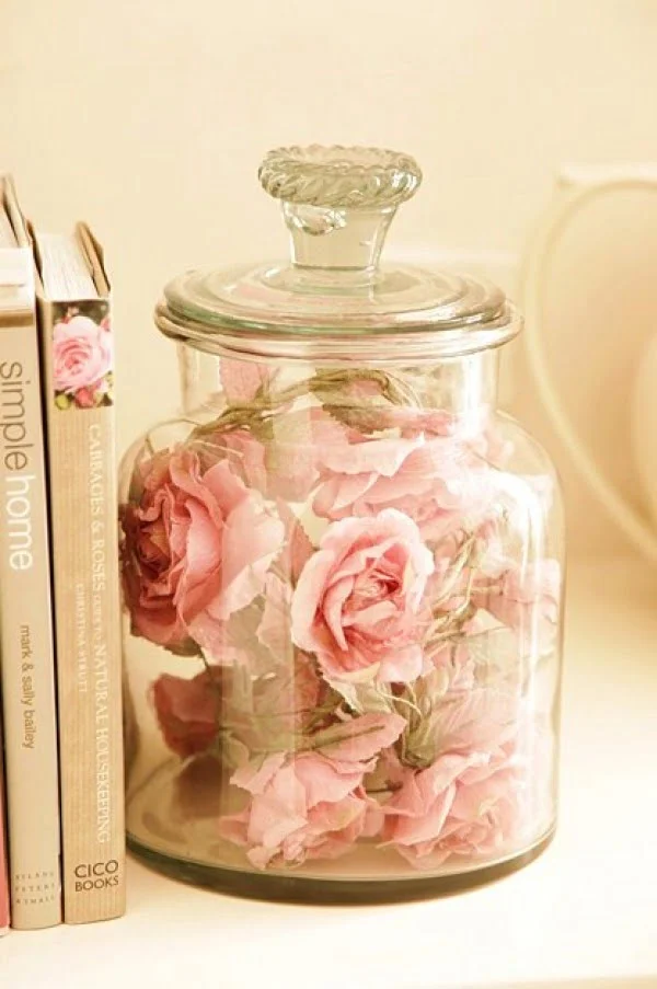 Lovely shabby chic decor vignette with floral jar