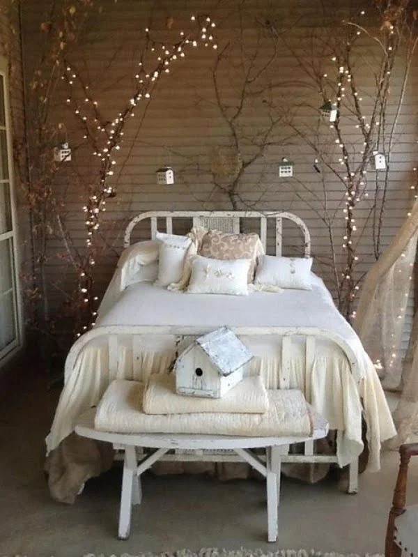 Love the idea of tree branches and fairy lights for shabby chic bedroom decor 