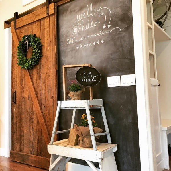 30 Unique Home Decor Ideas That Are Totally Doable -  decor done right with accent barn door and chalkboard