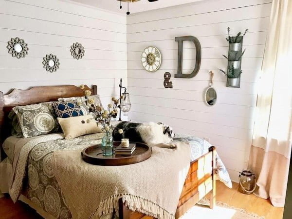 Rustic bedroom with planked walls. Love the  style!  