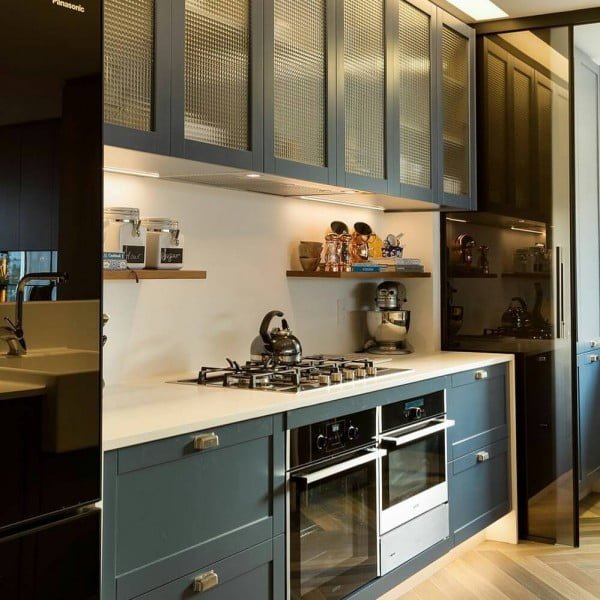 You have to see these blue kitchen cabinets with glass doors. Love it!