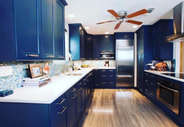 You have to see these blue kitchen cabinets with white countertops. Love it!