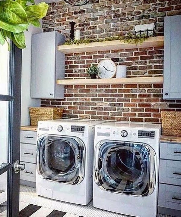 Check out this laundry room decor idea with exposed brick wall. Brilliant! #LaundryRoomDesign #HomeDecorIdeas 