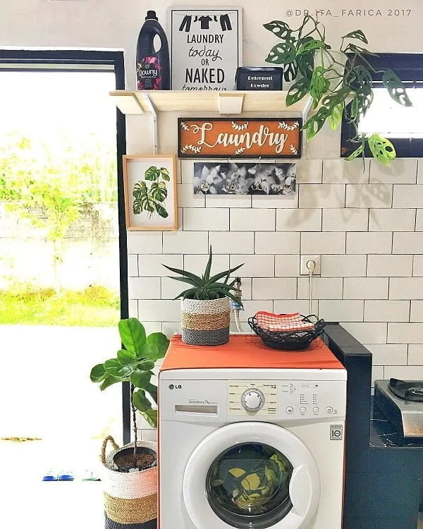 100 Fabulous Laundry Room Decor Ideas You Can Copy - Check out this laundry room decor idea with plants. Brilliant!