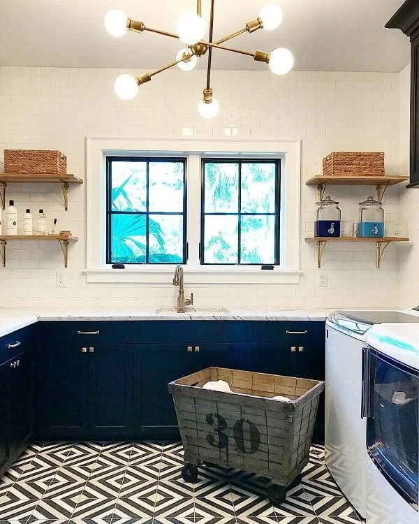 100 Fabulous Laundry Room Decor Ideas You Can Copy - Inspiring modern style laundry room decor with statement chandelier