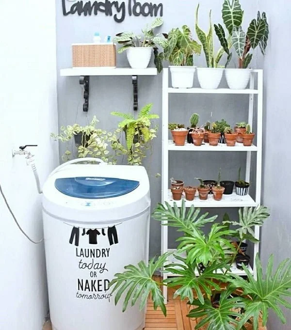 100 Fabulous Laundry Room Decor Ideas You Can Copy - Check out this laundry room decor idea with planters. Love it!