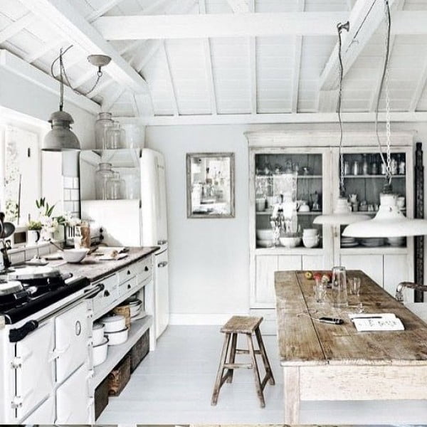 Check out this unusual white washed farmhouse kitchen design. Love it!
