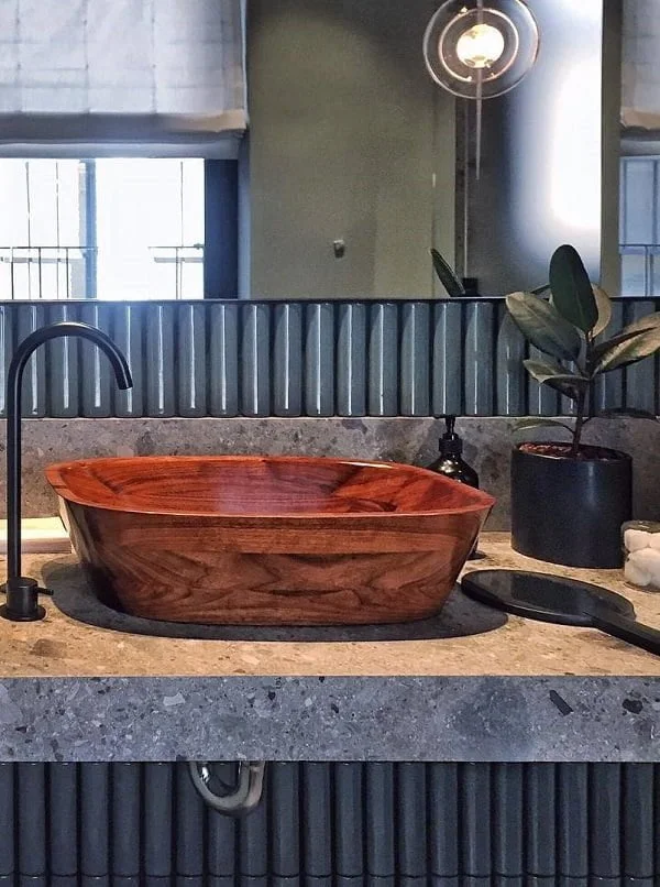 A wooden sink is a brilliant accent in  decor. Love this!   