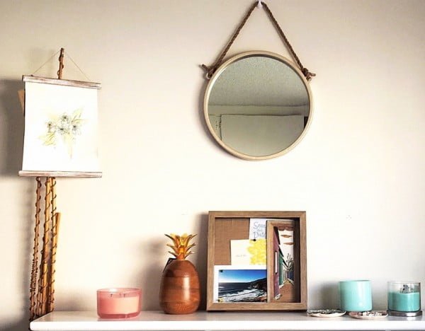 California chic decor idea with a nautical accent mirror. Love it!