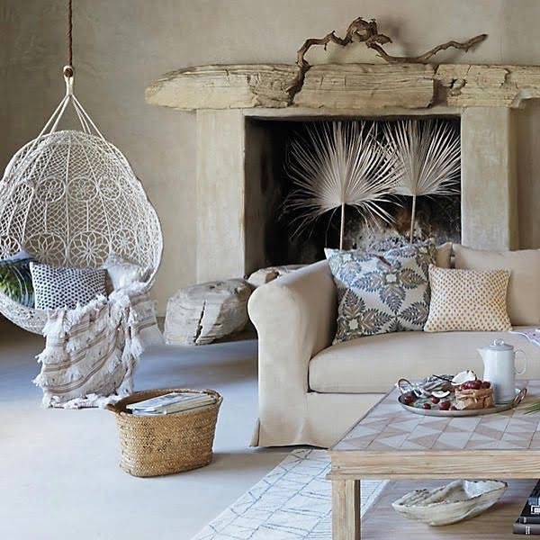California chic decor idea with a hanging chair. Love it!
