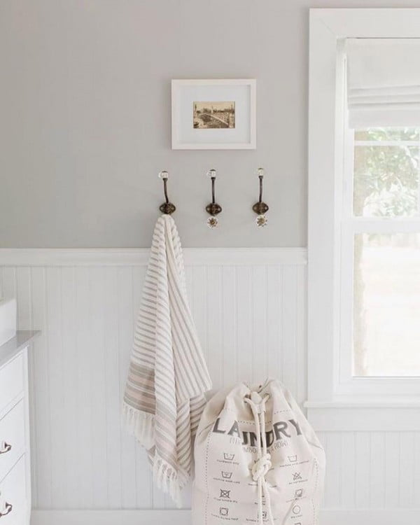 modern  laundry room decor idea with shabby chic wall hooks. Love it!  