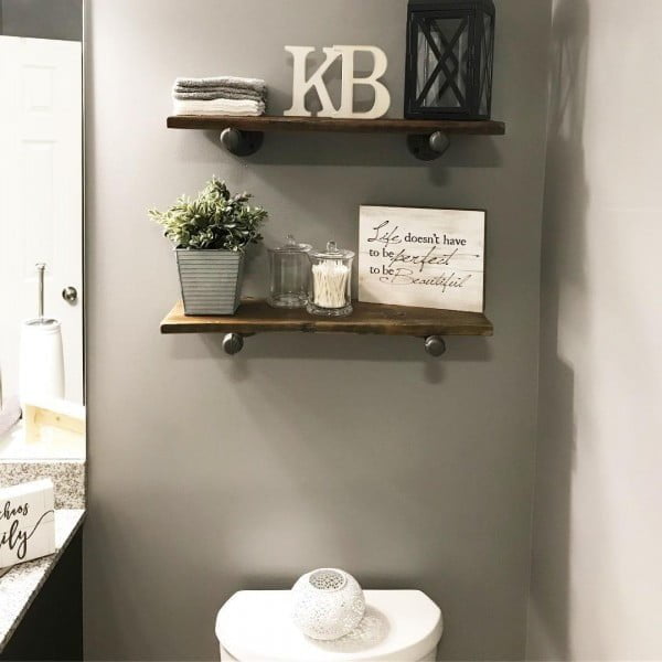 100 Cozy Rustic Farmhouse Bathroom Decor Ideas You Can Easily Copy - Check out this  bathroom decor idea with wood and pipe shelves. Love it!  