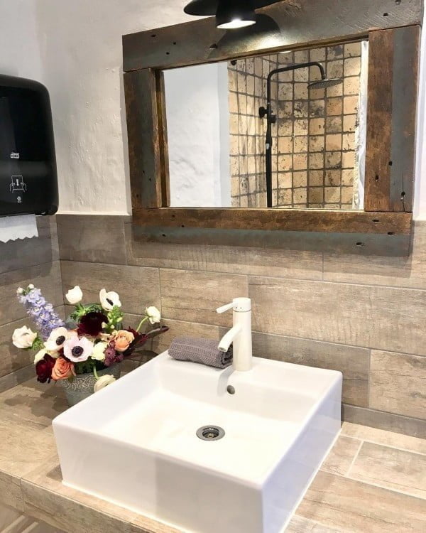 100 Cozy Rustic Farmhouse Bathroom Decor Ideas You Can Easily Copy - Check out this  bathroom decor idea with wood plank tiles. Love it!  