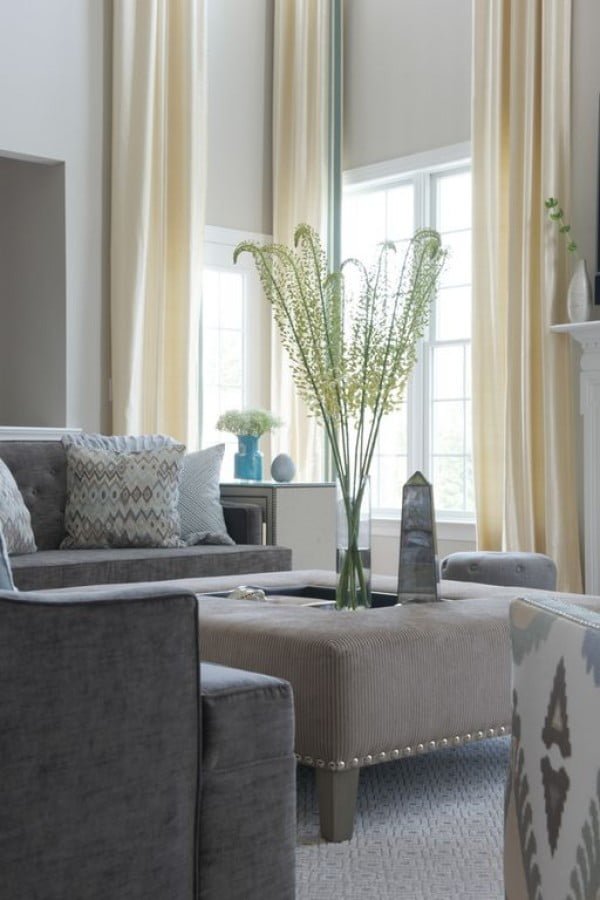 living room decor idea with tufted coffee table. Love it!