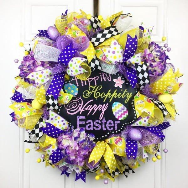 Check out this   wreath idea with vibrant color ribbons. Love it! 