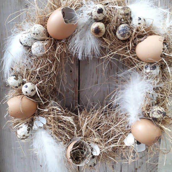 Check out this   wreath idea with egg shells and feathers. Love it! 