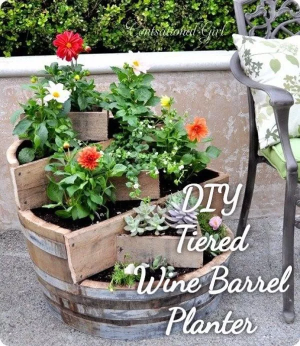 Great idea! Check out the tutorial on how to make a  tiered wine barrel garden planter 