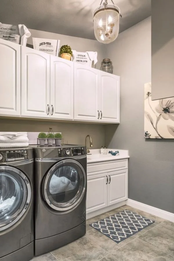 100 Fabulous Laundry Room Decor Ideas You Can Copy - You have to see this laundry room decor idea with a pendant light. Love it!