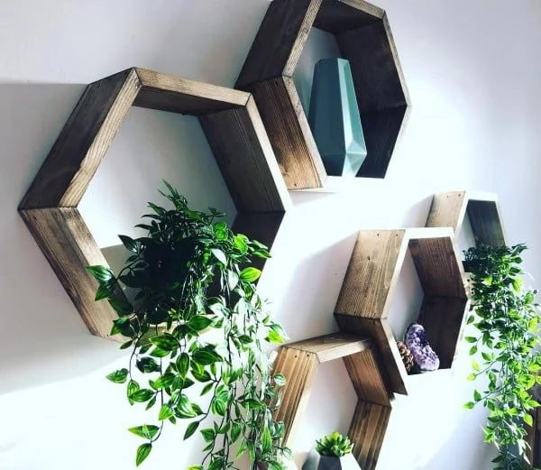 You have to see this  wall decor idea with hexagonal shelves. Love it! 