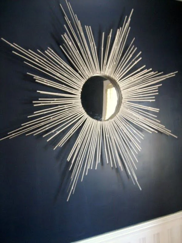 Check out the tutorial on how to make a  bamboo sunburst mirror. Looks easy enough!  