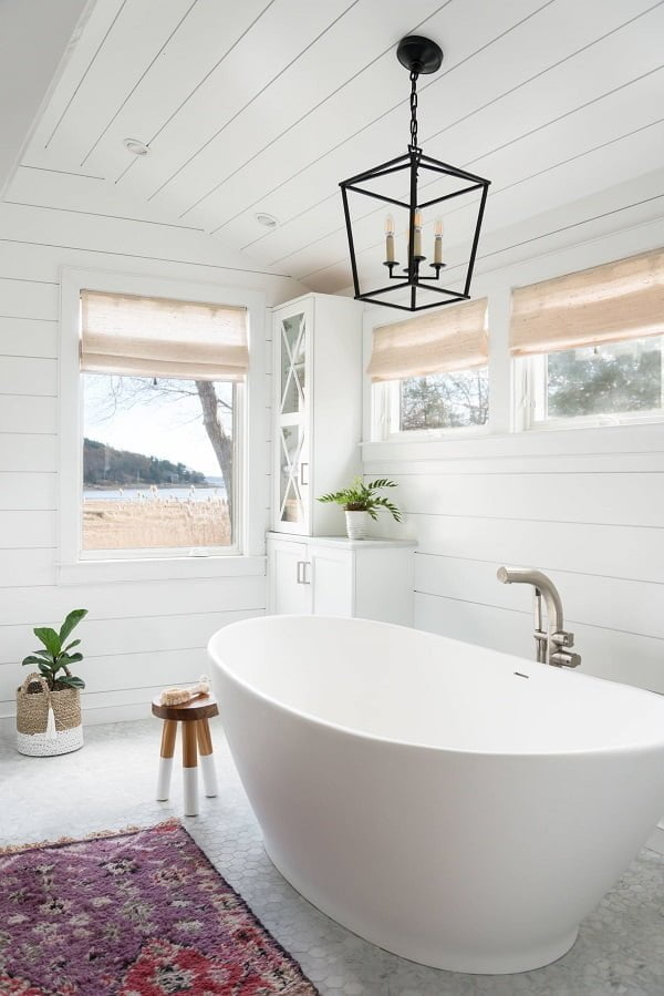 100 Cozy Rustic Farmhouse Bathroom Decor Ideas You Can Easily Copy - You have to see this bathroom decor idea with mosaic bathroom floor and white decor elements. Love it!  