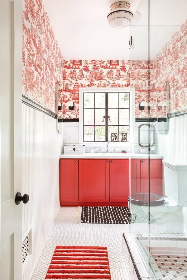 100 Cozy Rustic Farmhouse Bathroom Decor Ideas You Can Easily Copy - You have to see this bathroom decor idea with bright red cabinets and a two-piece toilet. Love it!  