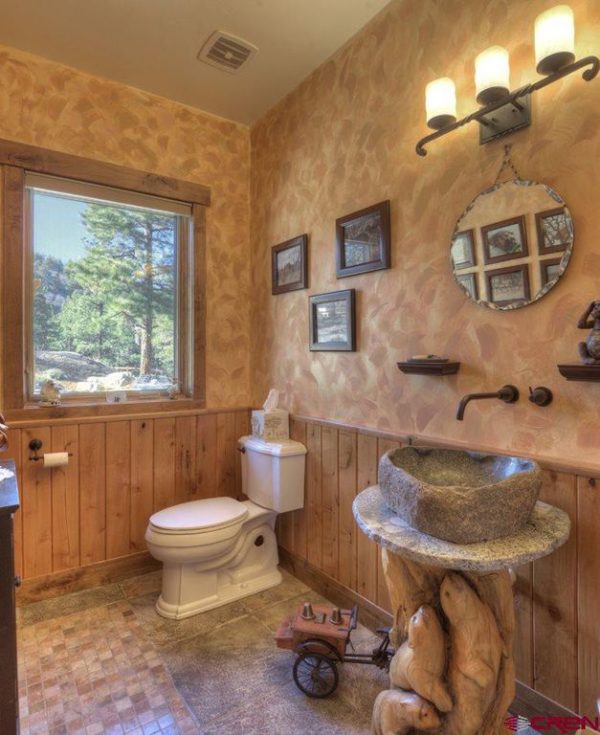 100 Cozy Rustic Farmhouse Bathroom Decor Ideas You Can Easily Copy - You have to see this bathroom decor idea with cottage-like details and a sensational landscape window view. Love it!  