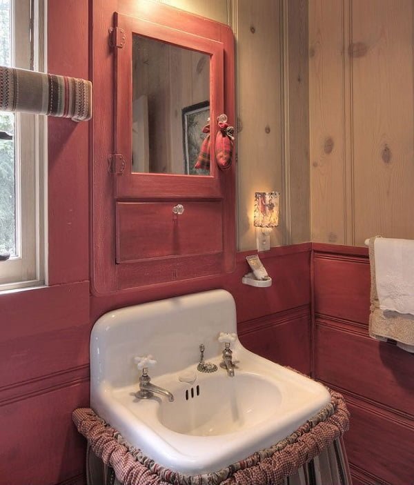 100 Cozy Rustic Farmhouse Bathroom Decor Ideas You Can Easily Copy - You have to see this bathroom decor idea with double-faucet sink and medical cabinet with a mirror. Love it!  