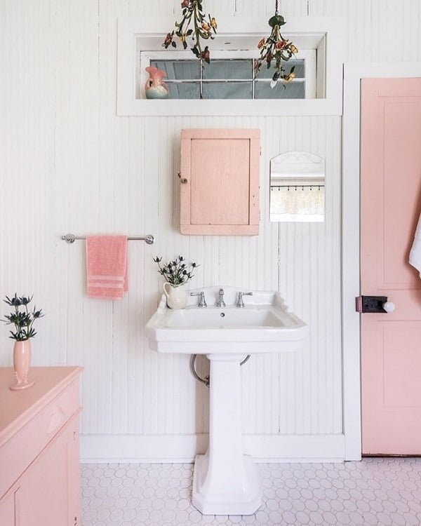 100 Cozy Rustic Farmhouse Bathroom Decor Ideas You Can Easily Copy - You have to see this bathroom decor idea with vintage pink medicine cabinet and high internal ventilating window. Love it!  