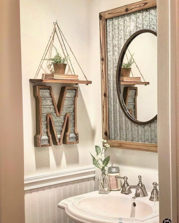 100 Cozy Rustic Farmhouse Bathroom Decor Ideas You Can Easily Copy - You have to see this bathroom decor idea with wooden ornaments and metalic faucet sink. Love it!  