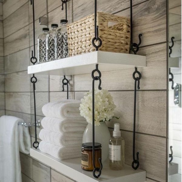 100 Cozy Rustic Farmhouse Bathroom Decor Ideas You Can Easily Copy - You have to see this bathroom decor idea with handpainted storage bottles and frameless silver mirror. Love it!  