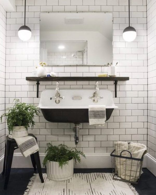 100 Cozy Rustic Farmhouse Bathroom Decor Ideas You Can Easily Copy - You have to see this bathroom decor idea with plastic stand stool and wired storage basket. Love it!  