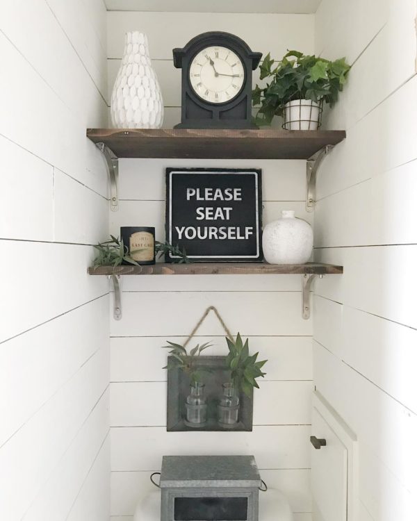 100 Cozy Rustic Farmhouse Bathroom Decor Ideas You Can Easily Copy - You have to see this bathroom decor idea with in-built ornamental shelf and vintage black clock. Love it!  