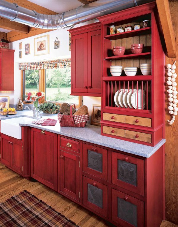  decor idea with red open and closed cabinets and handmade rustic carpet. Love it!   