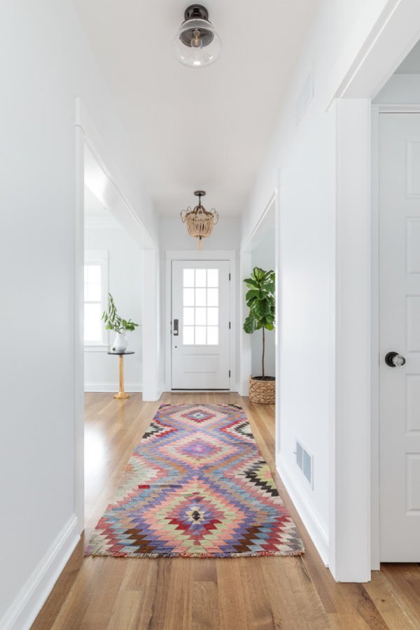  decor idea with long hallways and different-era lighting. Love it!   