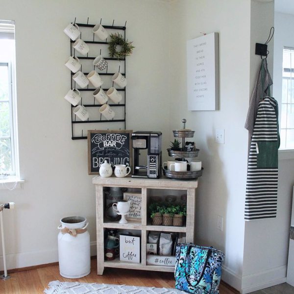  decor idea with a single clothes hanger, knitted mat and hardwood flooring. Love it!   