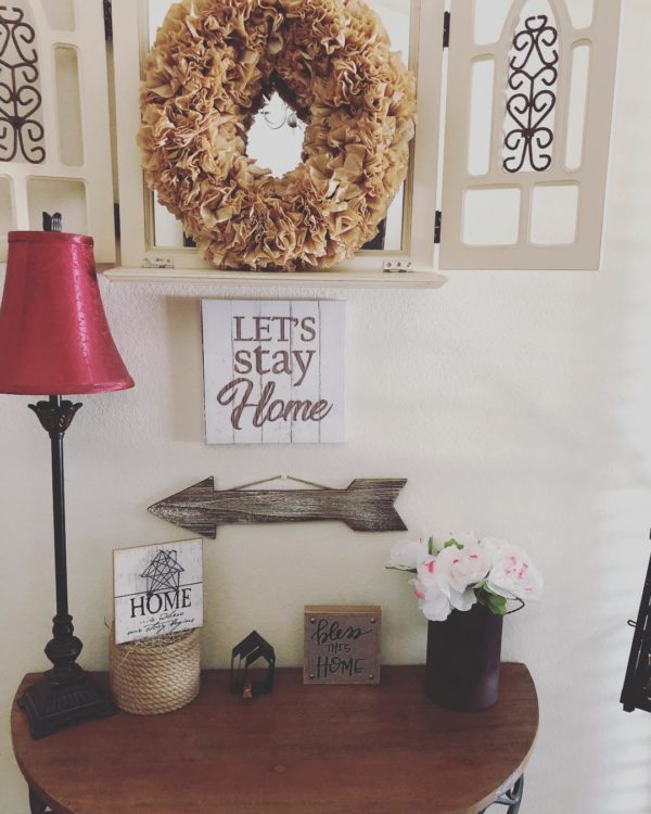  decor idea with a statement burgundy nightlamp and adjustable wood corner table. Love it!   