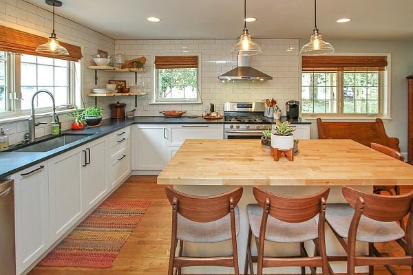 100 Stunning Farmhouse Kitchen Decor Ideas You Have to Try - You have to see this kitchen decor idea with dark countertops and transparent ceiling-hanging lights. Love it! Kitchen 