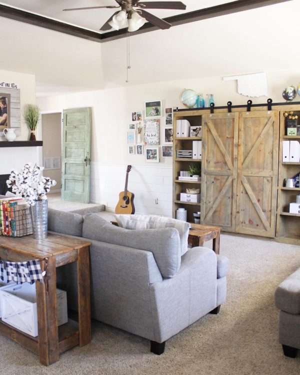 living room decor idea with a wooden sliding door closet and a traveler’s favorite souvenirs. Love it!