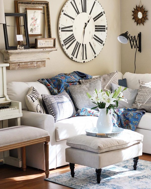 living room decor idea with attention-grabbing wall clock and comfortable sofa. Love it!