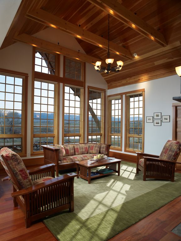 living room decor idea with incredible glass block windows and porch-inspired furnishing set. Love it!