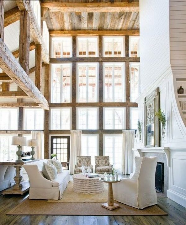 living room decor idea with double-tiered windows and white living room set. Love it!