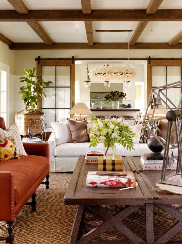 living room decor idea with a luxurious chandelier and lively floral arrangement! Love it!